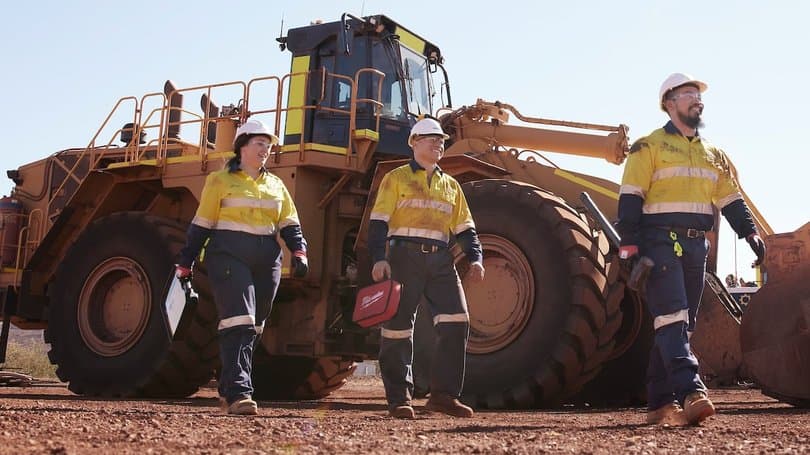 Mechanic servicing heavy equipment